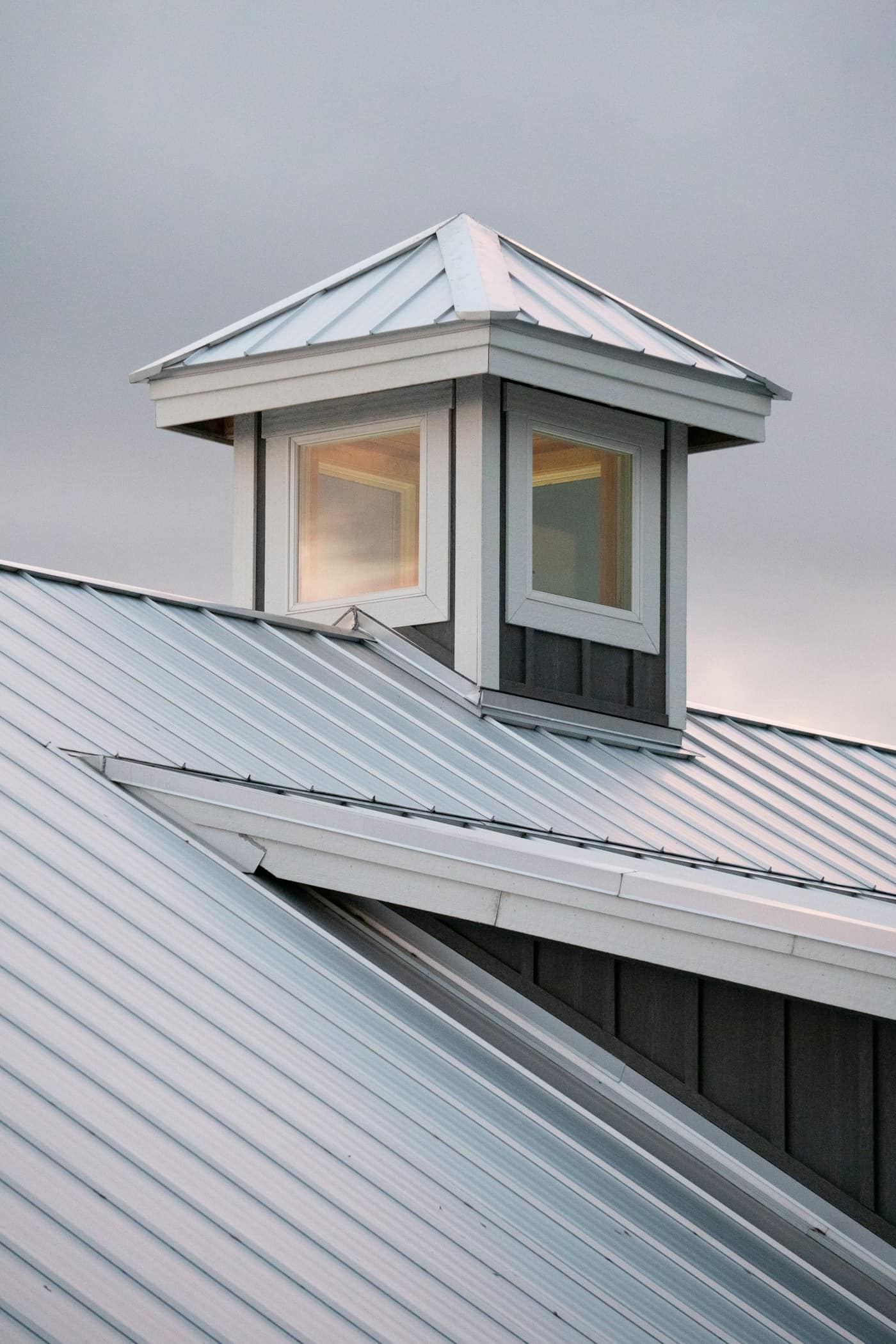 Standing-seam metal roof with cupola detail